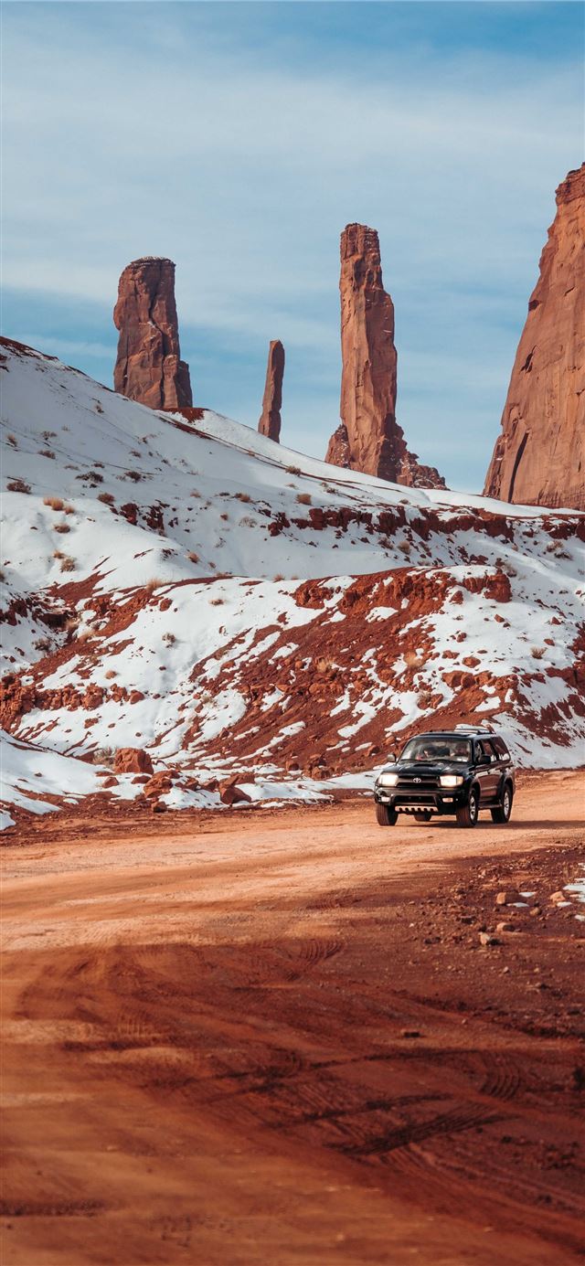 1125x2436 car travelling on desert - grey iPhone X Wallpaper