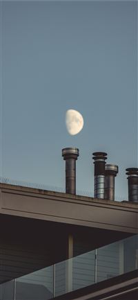 view of the moon on the sky and chimneys wallpaper