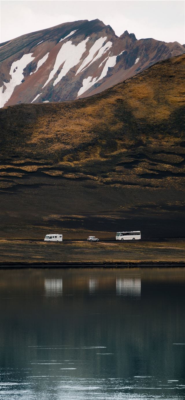 1125x2436 brown mountain range in landscape photography - snow iPhone X Wallpaper