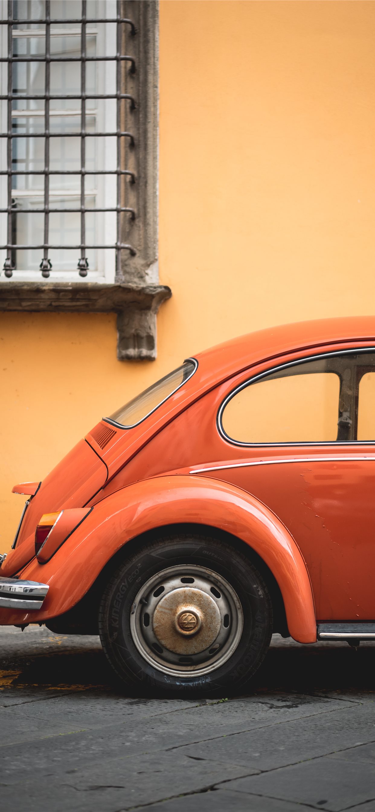 shallow focus photo of orange Volkswagen Beetle iPhone X Wallpapers Free  Download