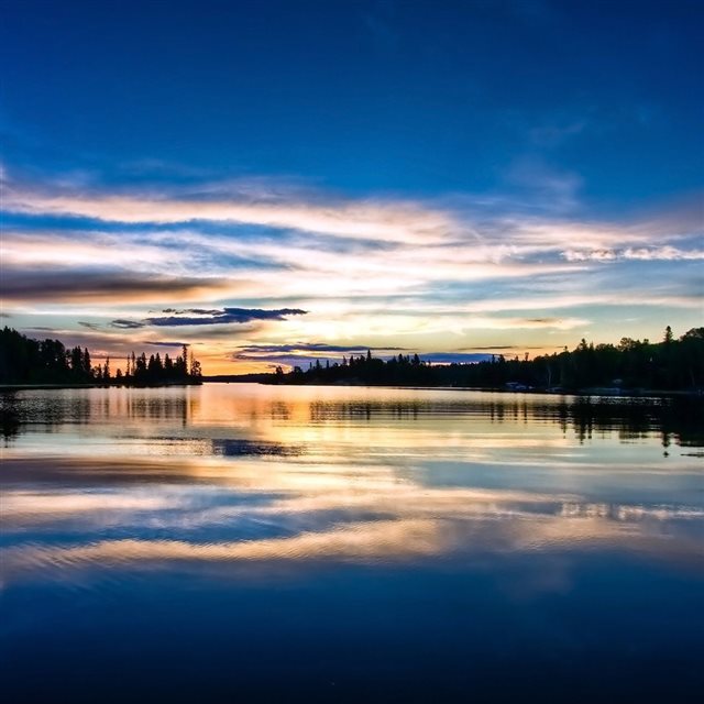 Lake reflecting the evening sky iPad wallpaper 