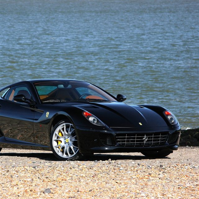 Ferrari Black Front View Beach iPad wallpaper 