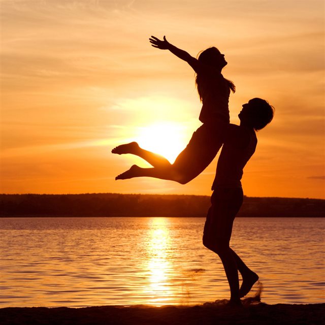 Lovers Flying Hug Under Sunset iPad wallpaper 