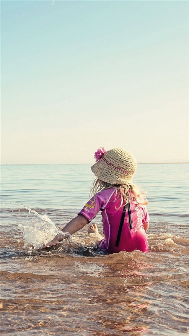 Girl Playing Beach  iPhone 8 wallpaper 