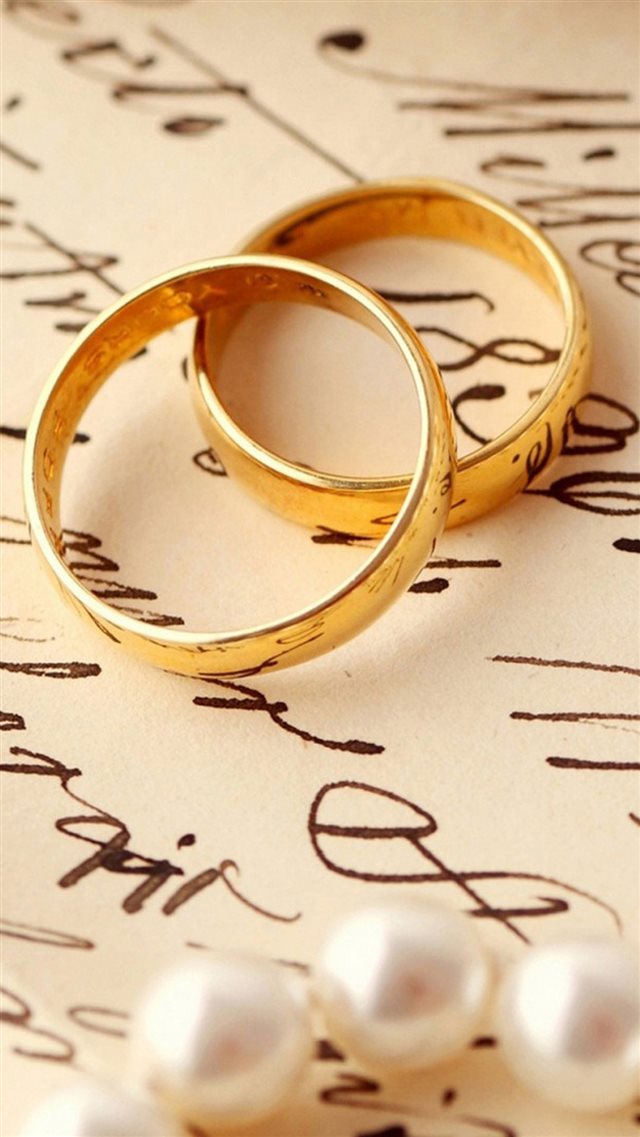 Love Romance Ring Pair On Book iPhone 8 wallpaper 