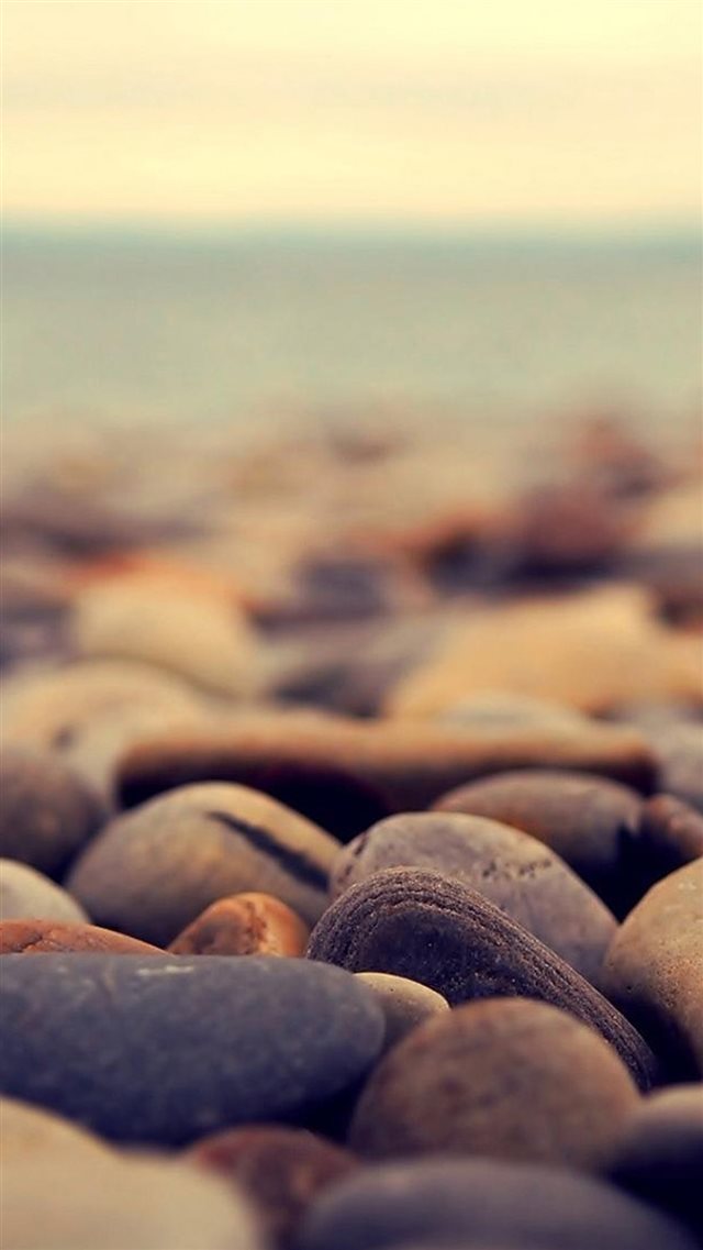 Ocean Beach Pebble Rocks Blur iPhone 8 wallpaper 