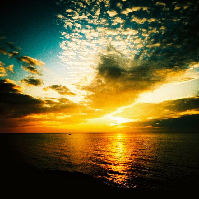 Gorgeous Sunrise Skyscape Over Sea iPad wallpaper 