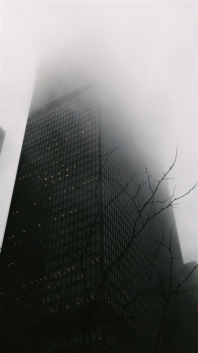 Skyscraper Covered In Fog  iPhone 8 wallpaper 