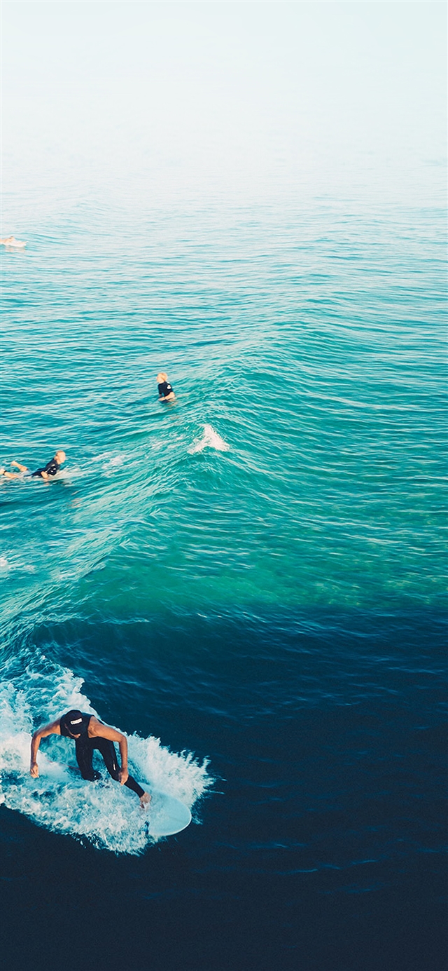 Surfing wave summer iPhone X wallpaper 