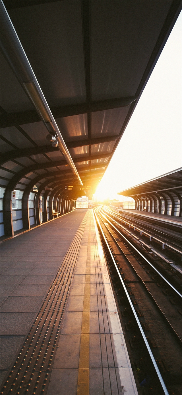 Train station charles city sun iPhone X wallpaper 