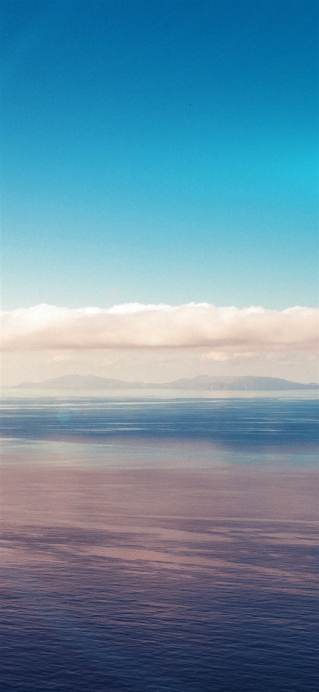 Blue sky ocean view flare iPhone X wallpaper 