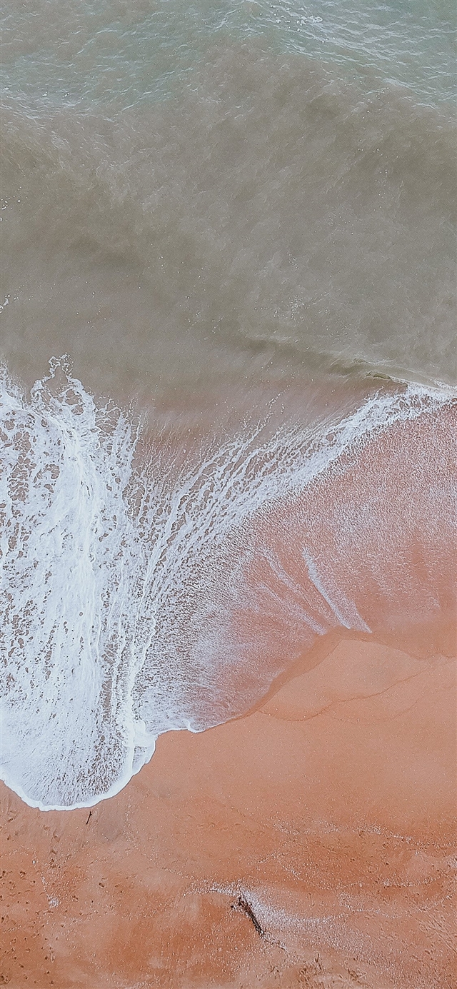 Beach sand sea iPhone X wallpaper 