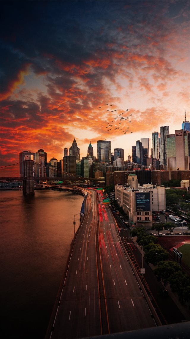 Sunset over Manhattan Bridge  iPhone 8 wallpaper 
