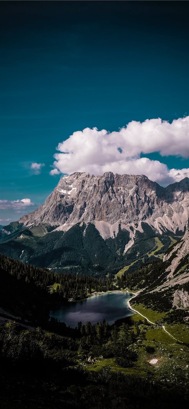 Zugspitze shrouded in clouds iPhone X wallpaper 