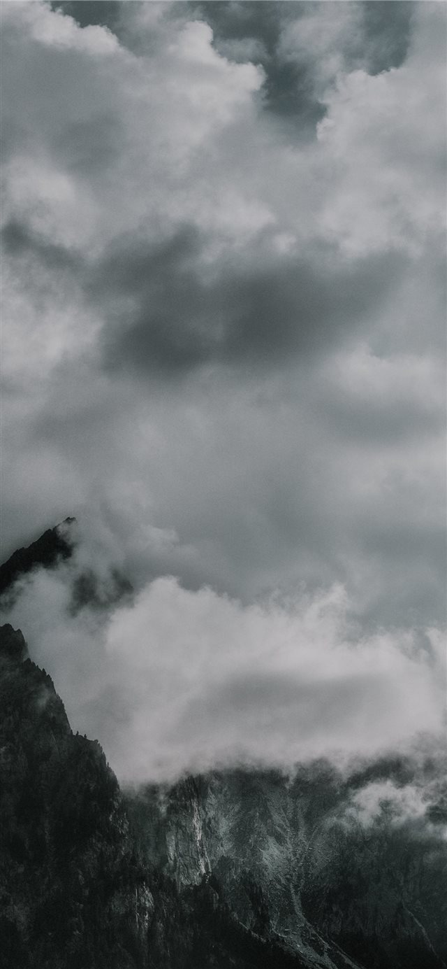 Cloudy summit iPhone X wallpaper 