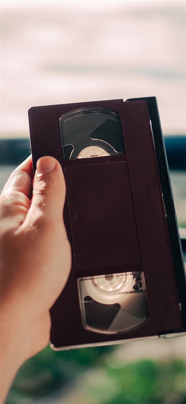 VHS tape I found on my bedroom iPhone X wallpaper 