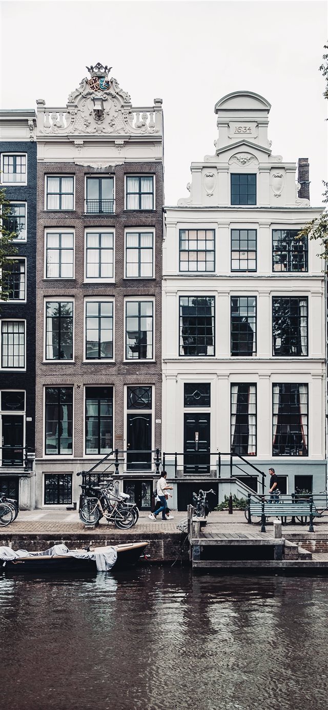Pedestrians in Amsterdam iPhone X wallpaper 