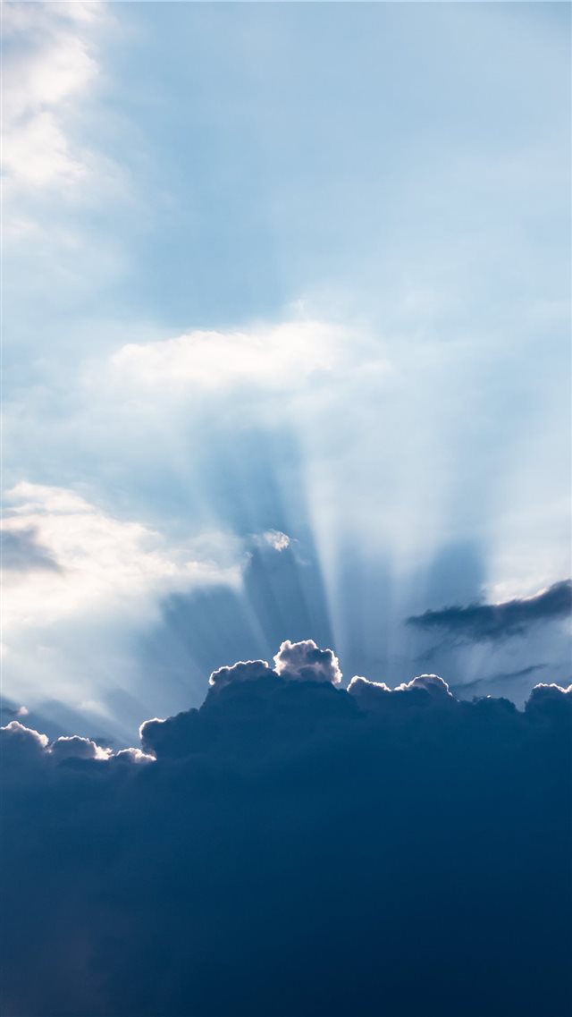 Sun behind the clouds iPhone 8 wallpaper 