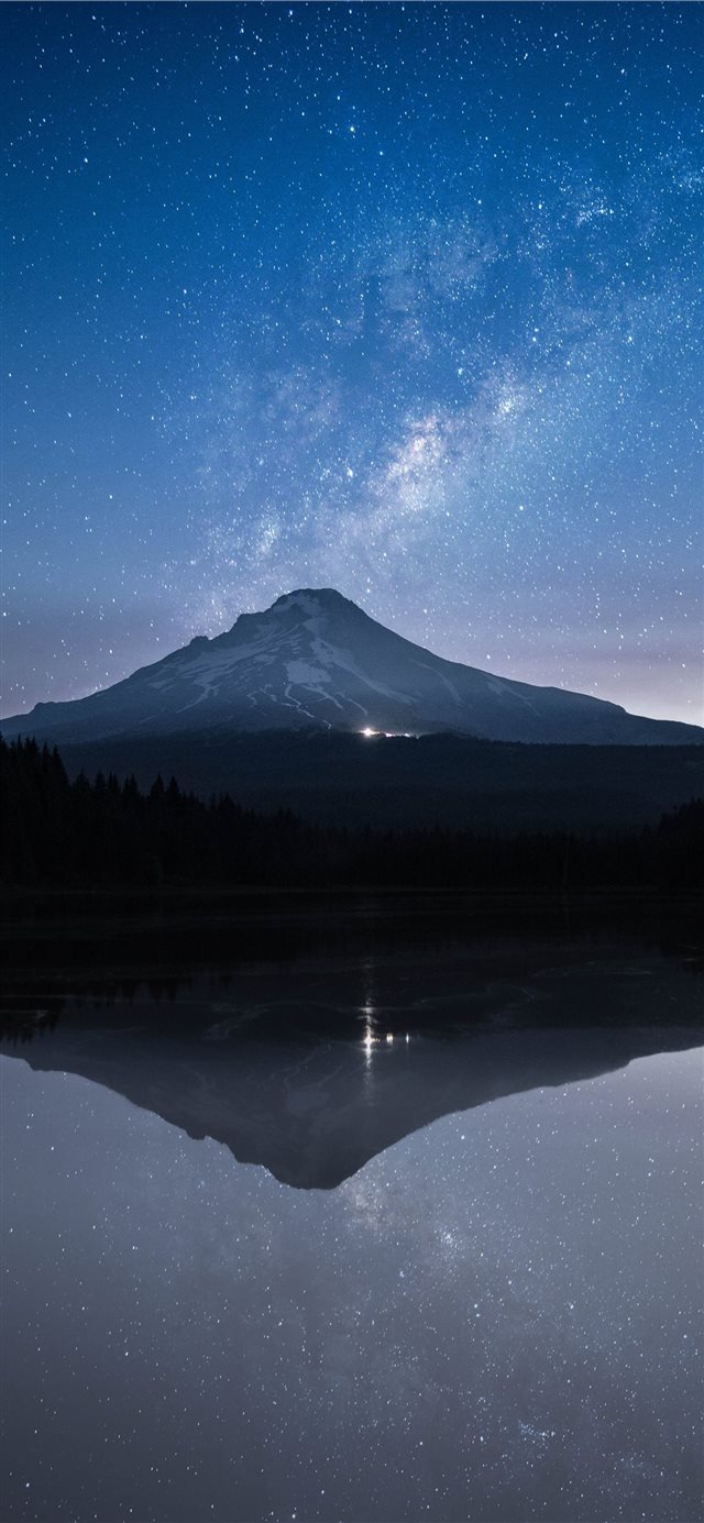 body of water with mountain at distance iPhone X wallpaper 