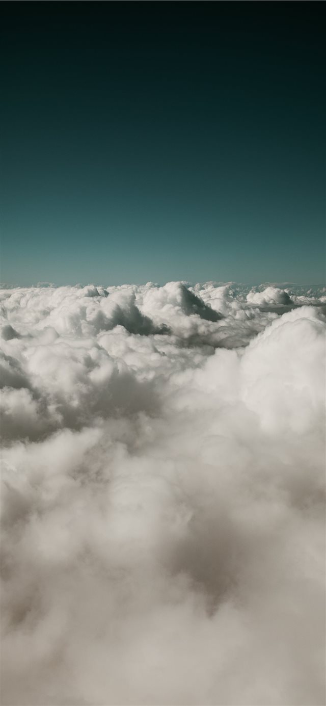 A simple shot out of an airplane  iPhone X wallpaper 