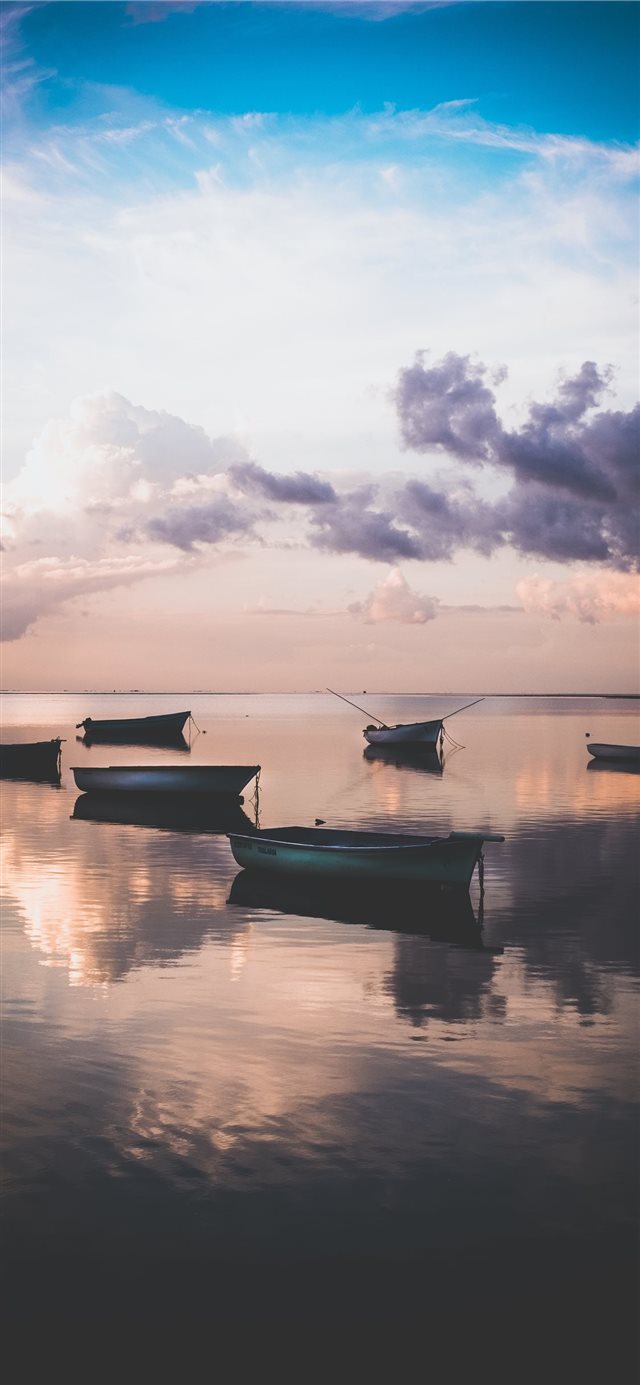 Sunset in Mauritius whilst the tide rolls in  iPhone X wallpaper 