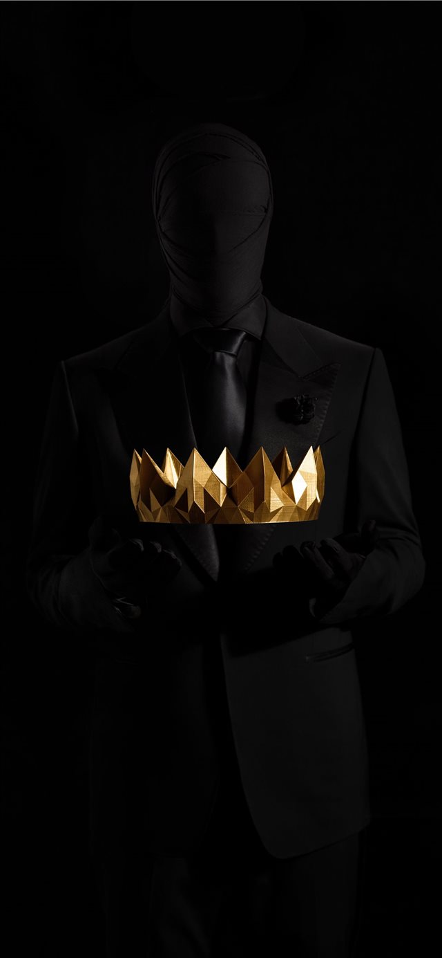 Silhouette holding gold crown iPhone X wallpaper 