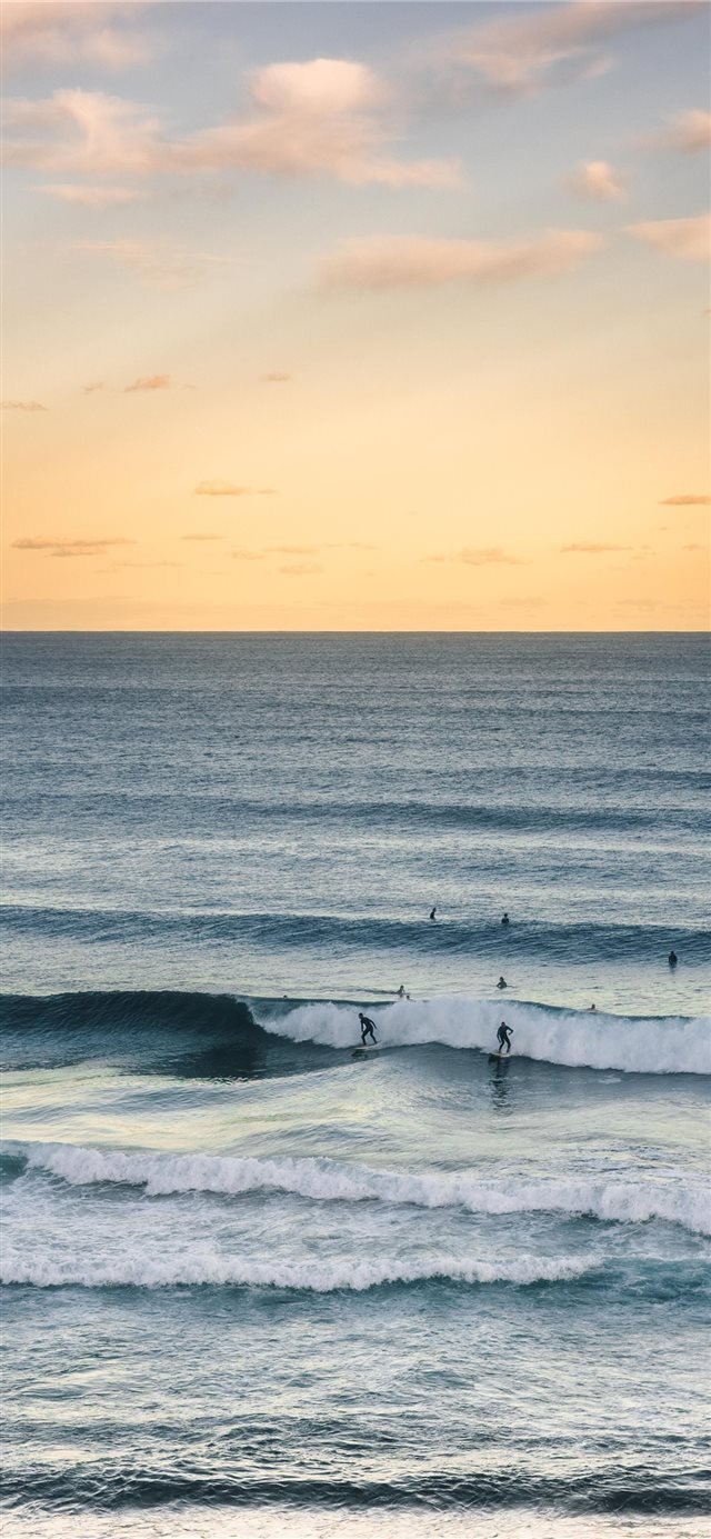 Surfing in Australia iPhone X wallpaper 