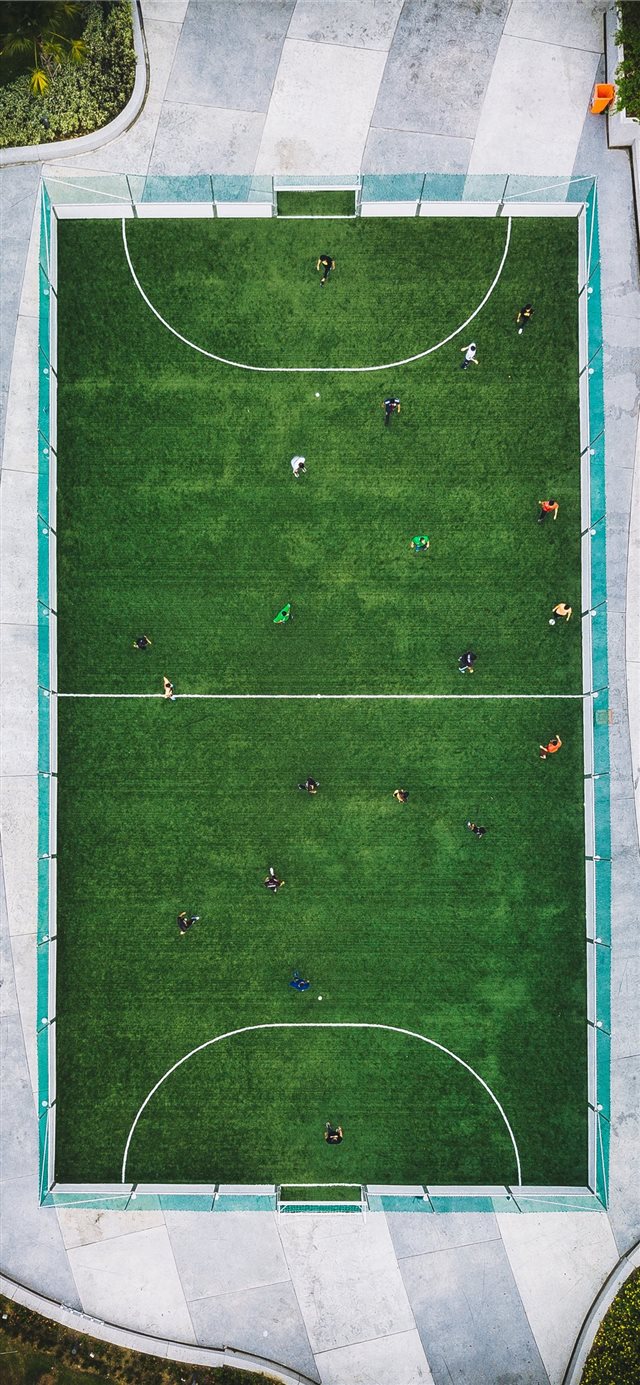 aerial photography of people playing soccer iPhone X wallpaper 