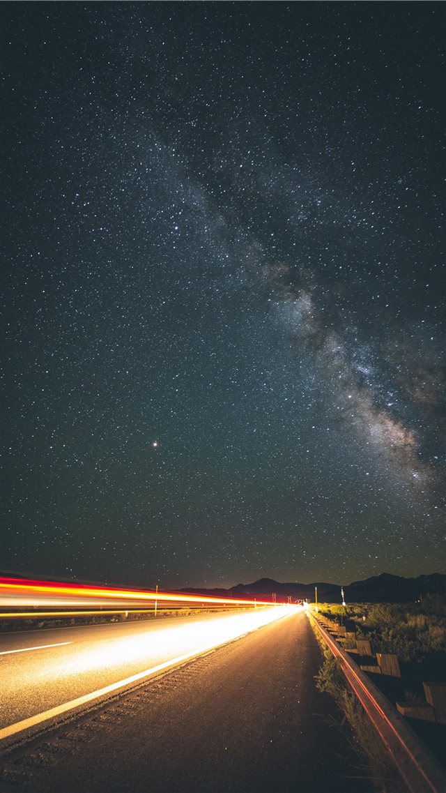 empty gray concrete road at nighttime iPhone 8 wallpaper 