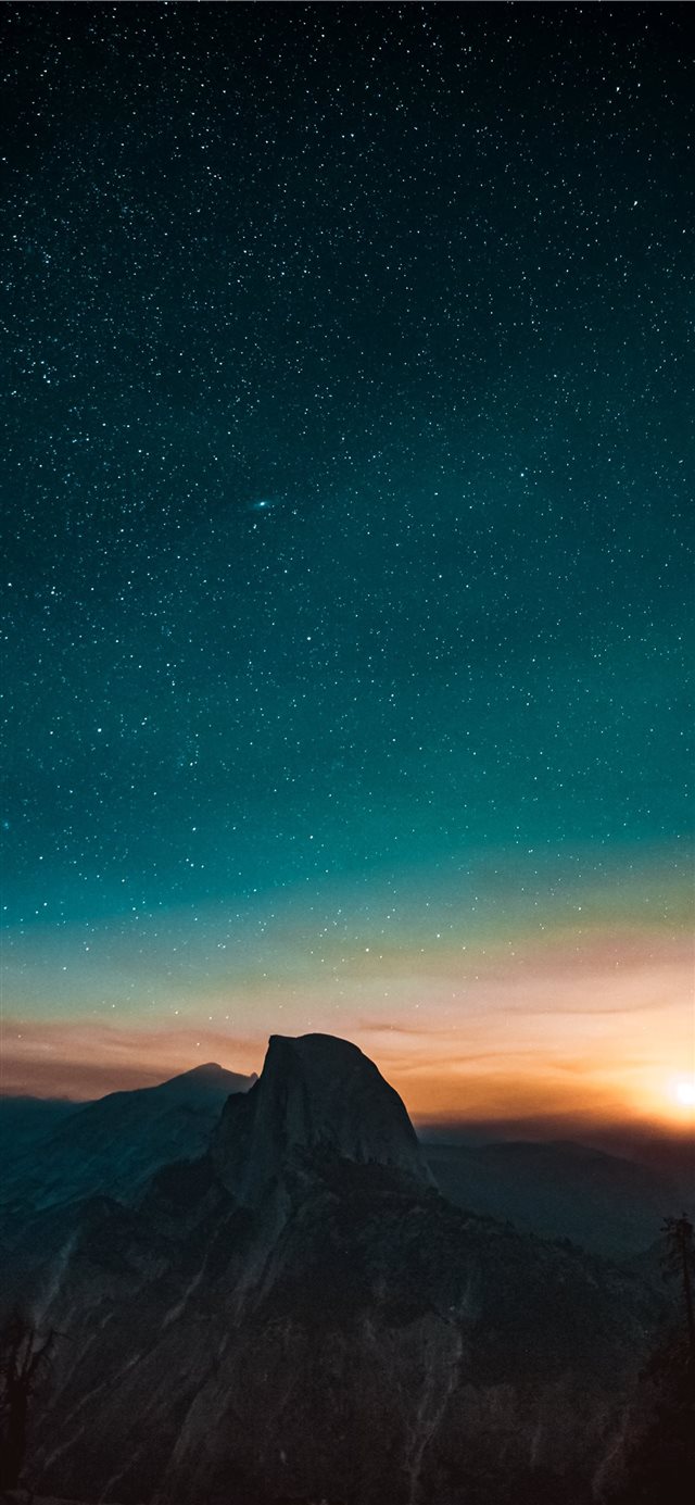 high angle photography of mountain at sunset iPhone 11 wallpaper 
