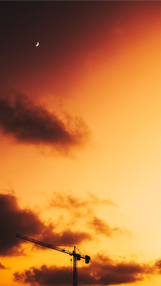 industrial crane during golden hour iPhone 8 wallpaper 