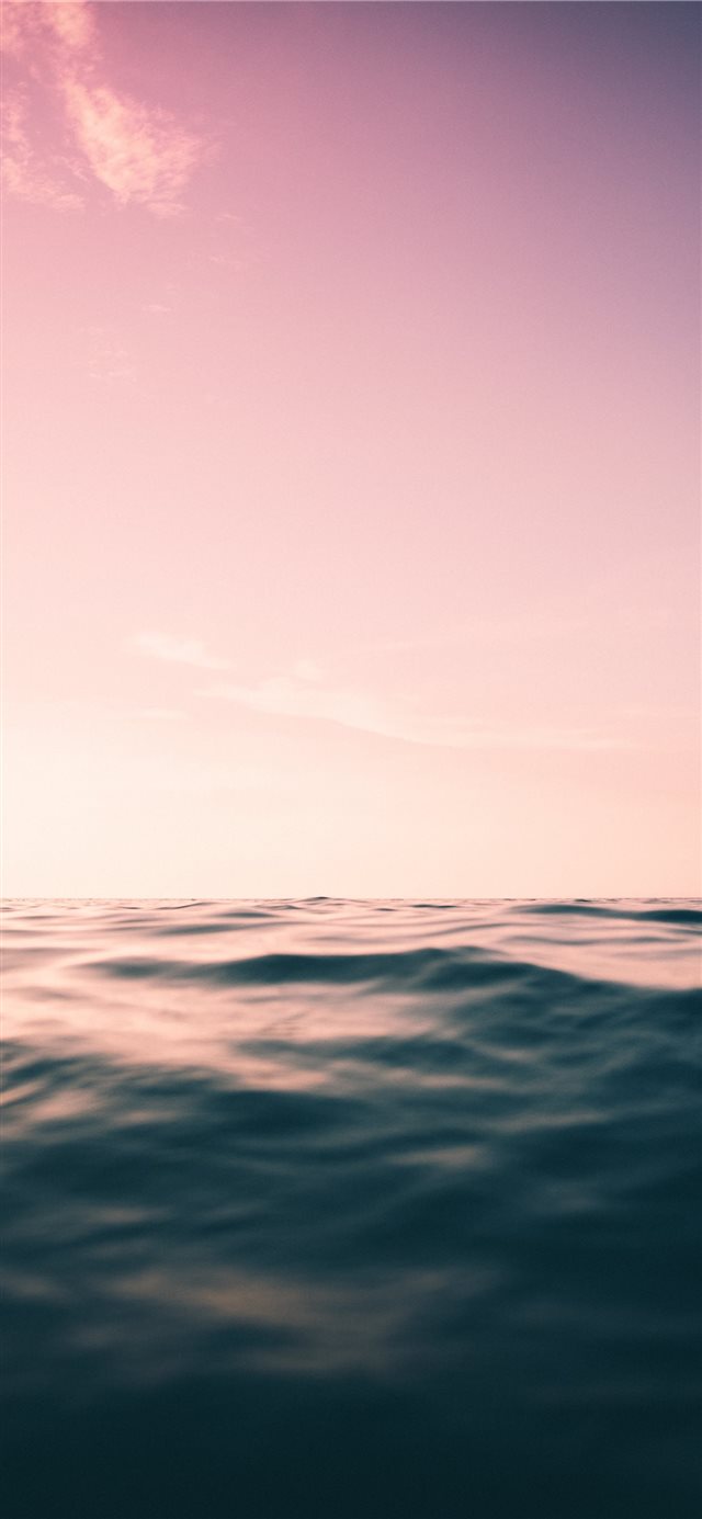 purple skies and ocean iPhone 11 wallpaper 