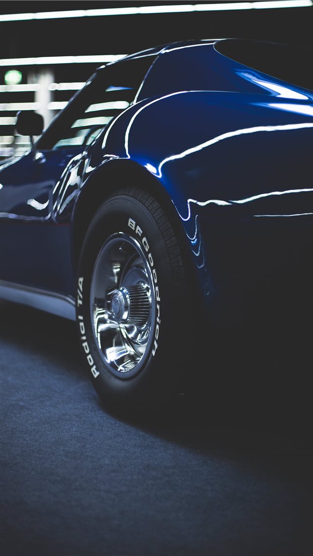 blue coupe on gray concrete pavement iPhone 8 wallpaper 