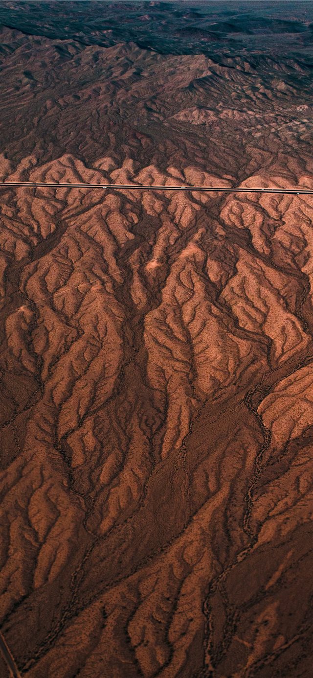 brown canyon view during daytime iPhone X wallpaper 
