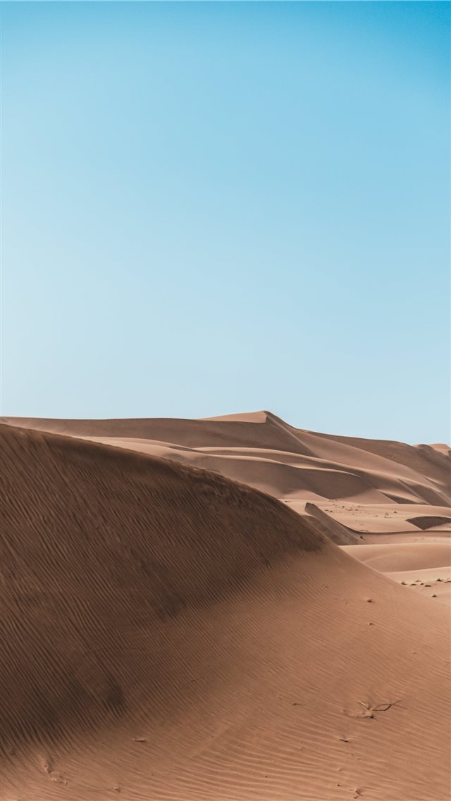 brown sand under white cloudy sky iPhone 8 wallpaper 