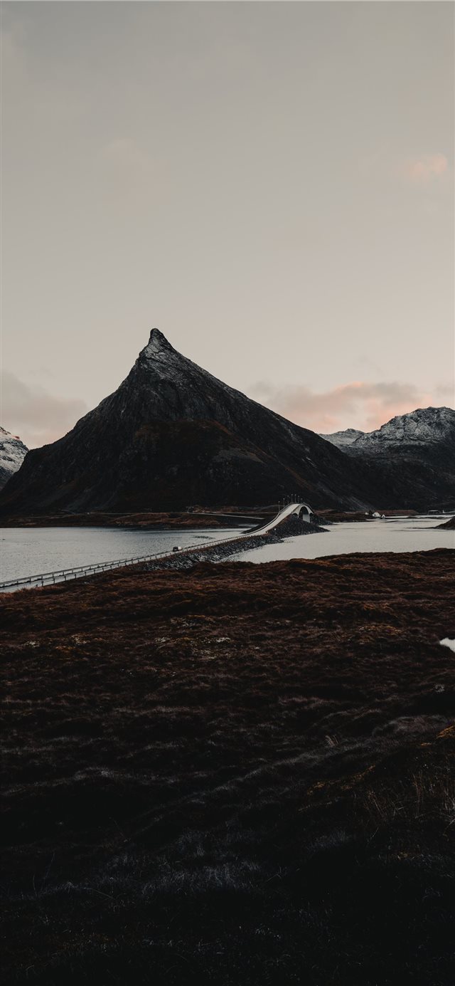 mountains beside bridge iPhone 11 wallpaper 