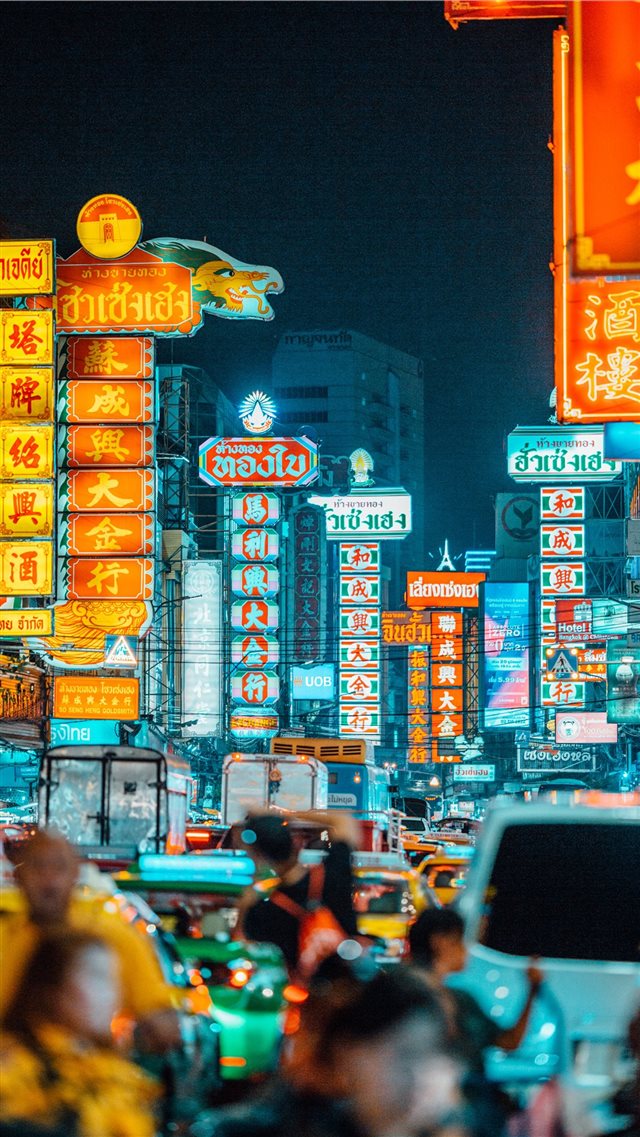 people walking on streets at nighttime iPhone 8 wallpaper 