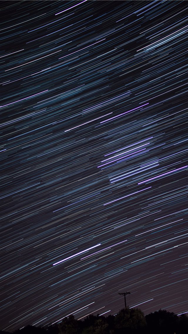 time lapse photography of falling stars iPhone 8 wallpaper 