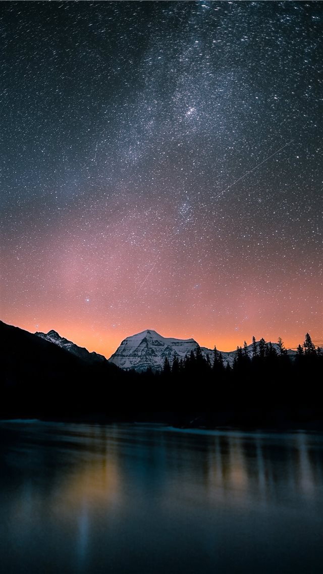 lake surrounded by trees and mountain under milky ... iPhone 8 wallpaper 