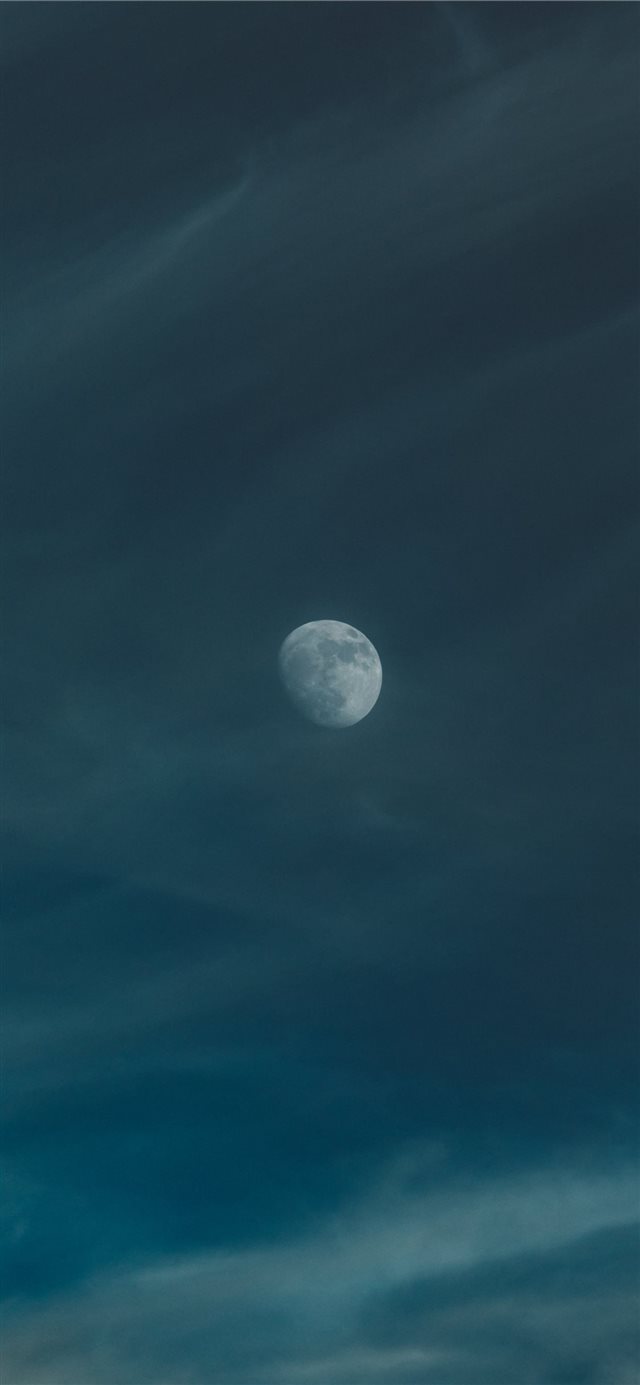 moon on gloomy sky iPhone X wallpaper 