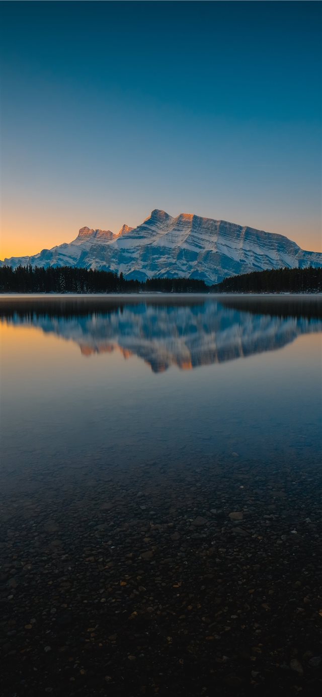 silhouette of mountain and lake iPhone X wallpaper 