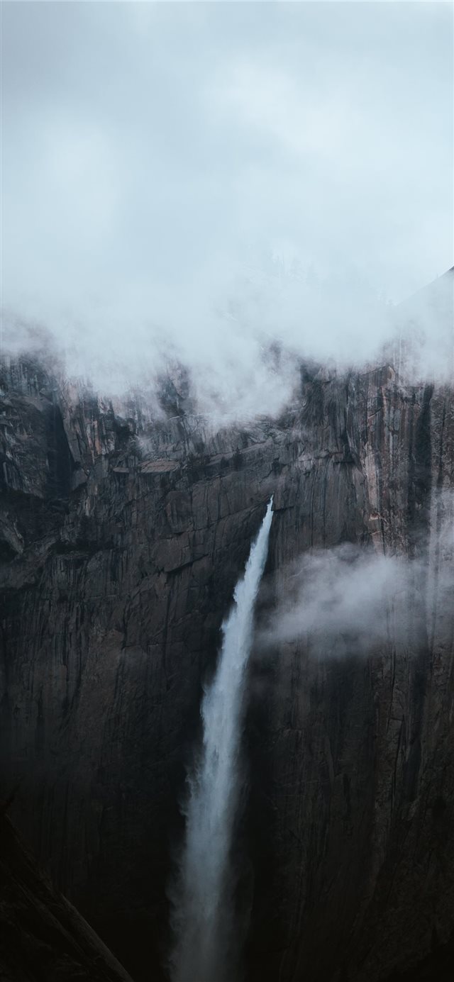 waterfall under white clouds at daytime iPhone X wallpaper 