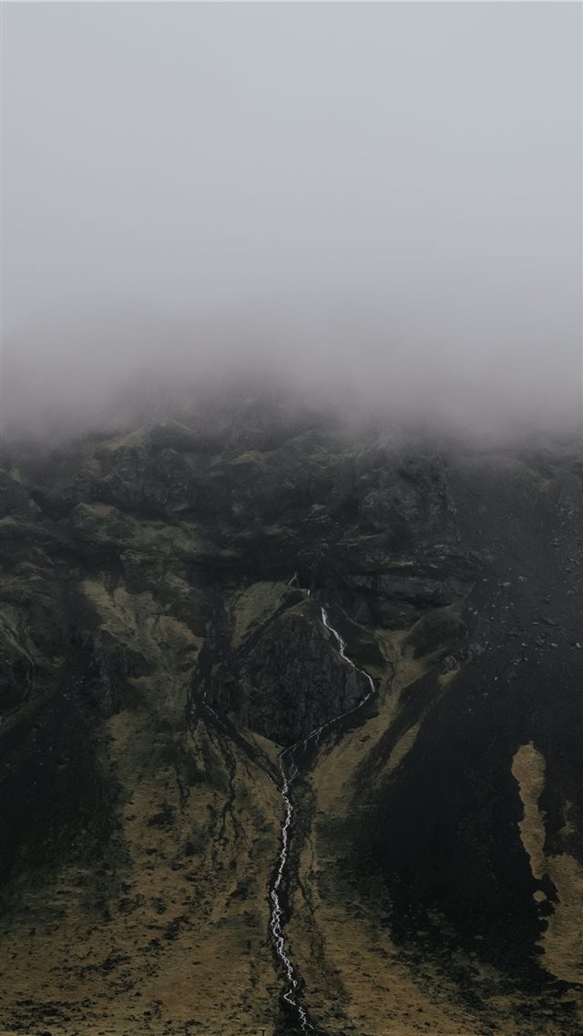 aerial photography of mountainous terrain iPhone 8 wallpaper 