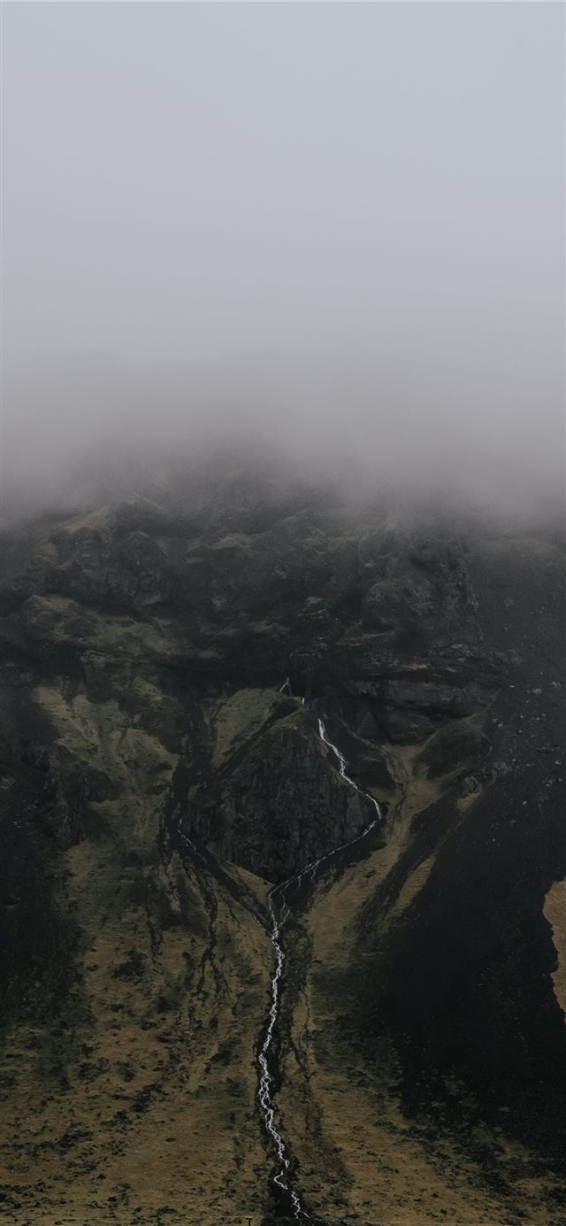 aerial photography of mountainous terrain iPhone X wallpaper 