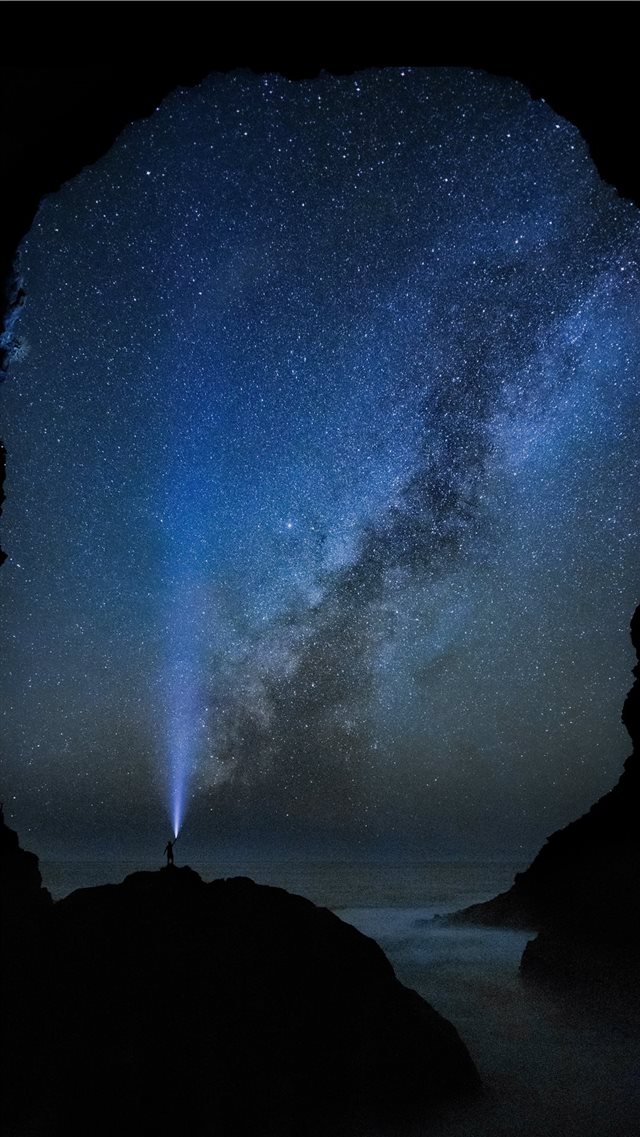 blue light under starry sky iPhone 8 wallpaper 