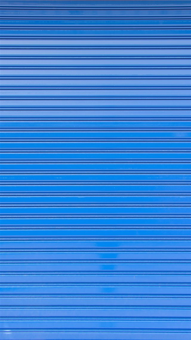 Blue roller shutter of a warehouse iPhone 8 wallpaper 