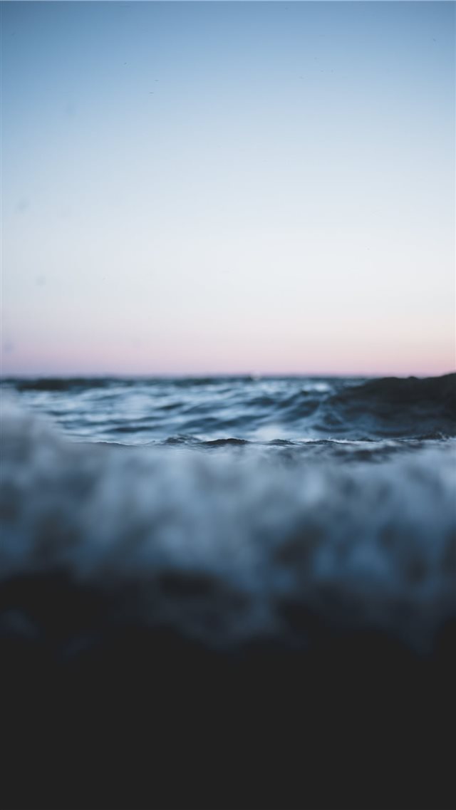 body of water under blue and white sky iPhone 8 wallpaper 