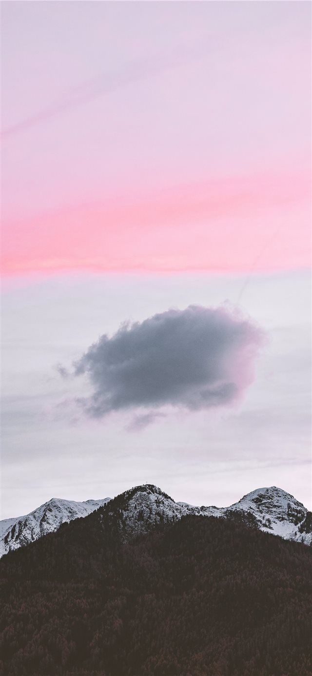 gray and brown mountain under white sky iPhone X wallpaper 