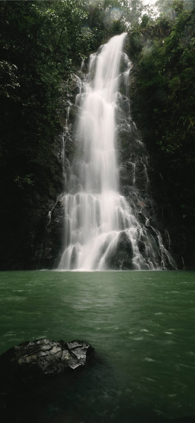 gray rock across waterfalls photo iPhone 11 wallpaper 
