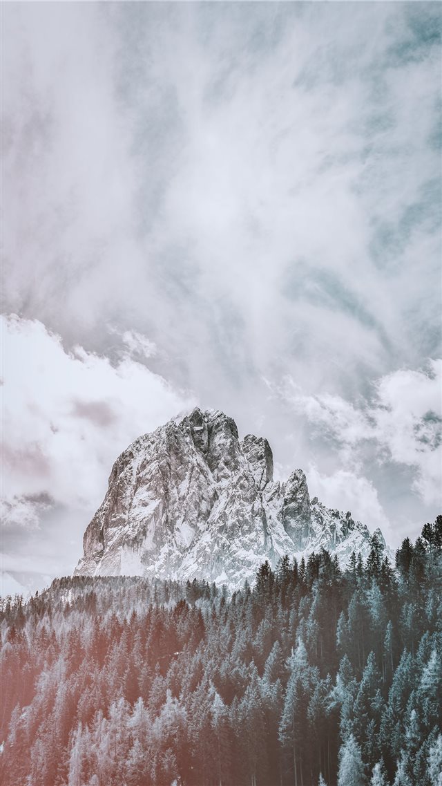 mountain covered with snow under white cloud and b... iPhone 8 wallpaper 
